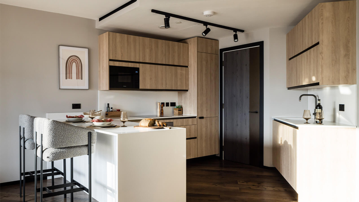 Kitchen area and breakfast bar at apartment 1911 The Stage, ©Galliard Homes.