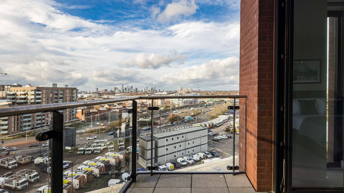Balcony view from a same aspect apartment at Orchard Wharf, ©Galliard Homes.
