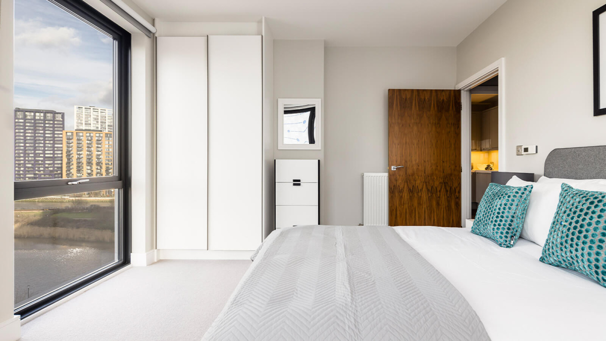 Bedroom with a view at an Orchard Wharf apartment, ©Galliard Homes.
