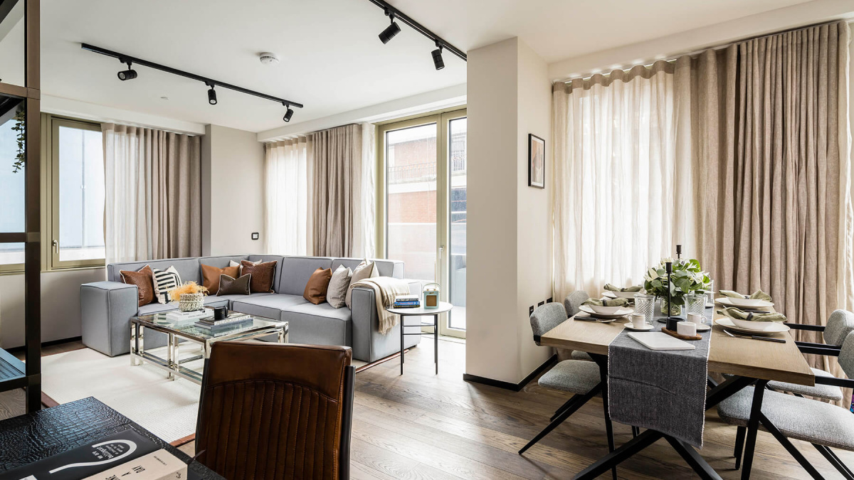 Open-plan living and dining room at a two-bedroom apartment at The Stage, ©Galliard Homes.