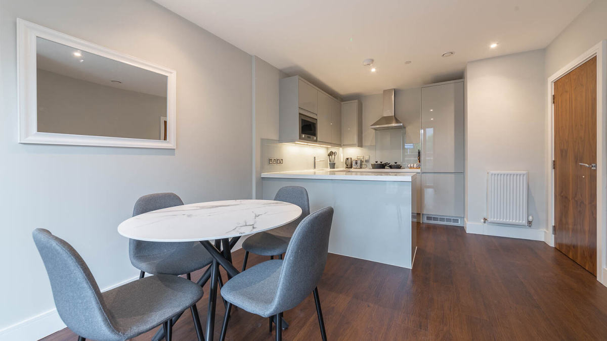 Open-plan dining and kitchen area at G03 Orchard Wharf ©Galliard Homes.