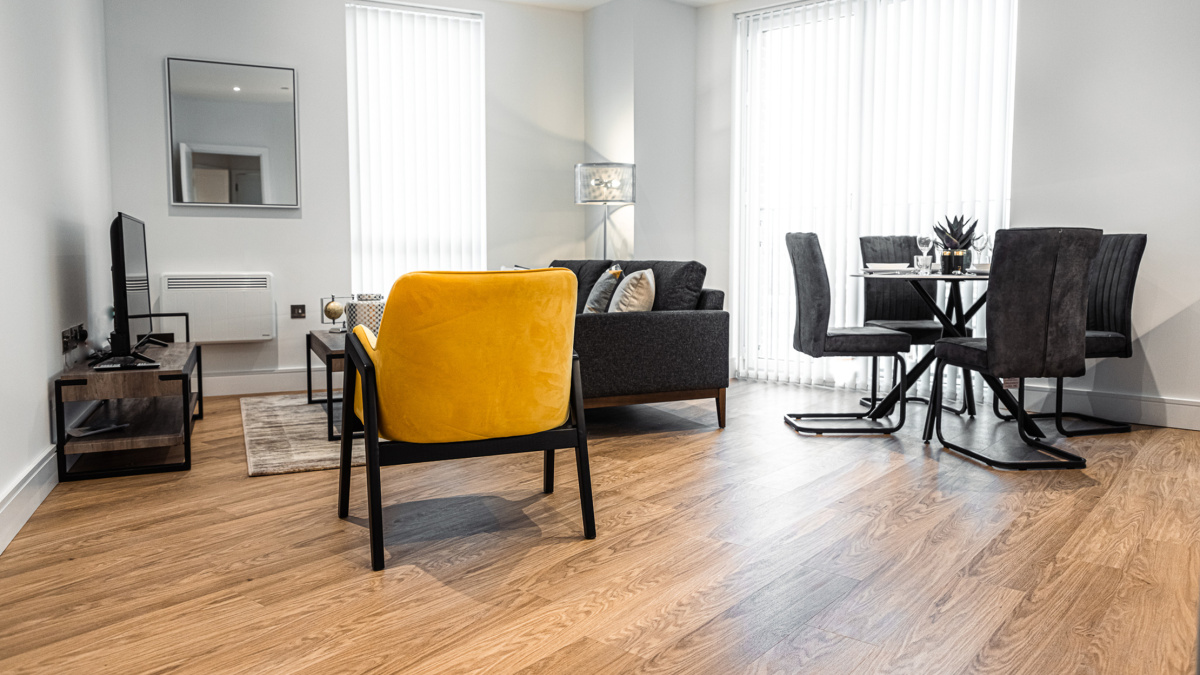 Open-plan living, kitchen and dining area at a Timber Yard apartment, ©Galliard Homes.