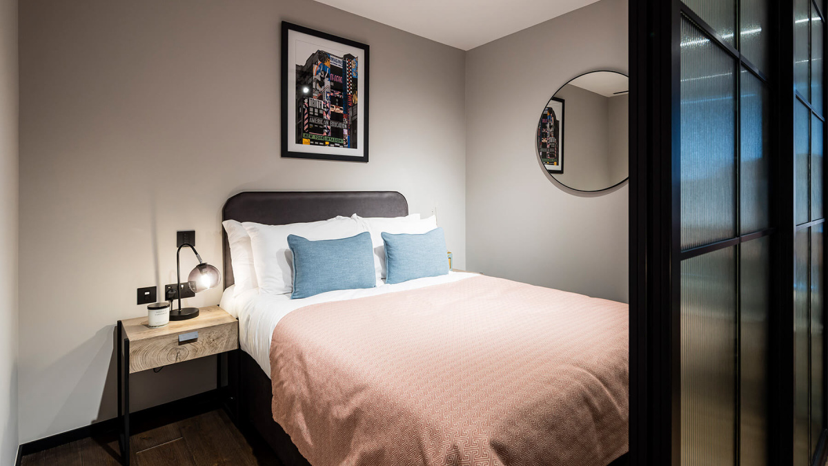 Bedroom in a studio suite at The Stage, ©Galliard Homes.
