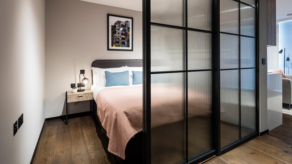 Bedroom in a studio suite at The Stage, ©Galliard Homes.