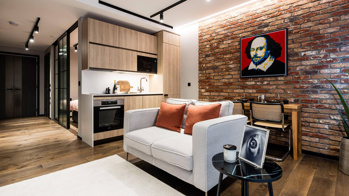 Open-plan living area in a studio suite at The Stage, ©Galliard Homes.