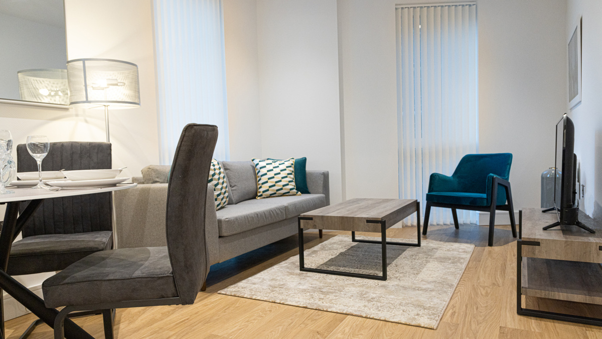 Open-plan living, kitchen and dining area at a Timber Yard apartment, ©Galliard Homes.