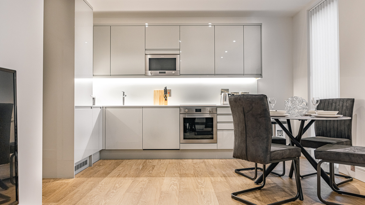 Open-plan living, kitchen and dining area at a Timber Yard apartment, ©Galliard Homes.