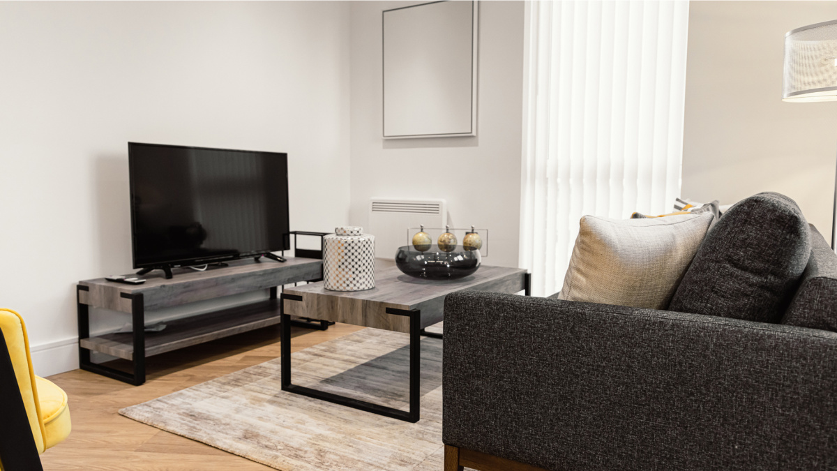 Open-plan living, kitchen and dining area at a Timber Yard apartment, ©Galliard Homes.