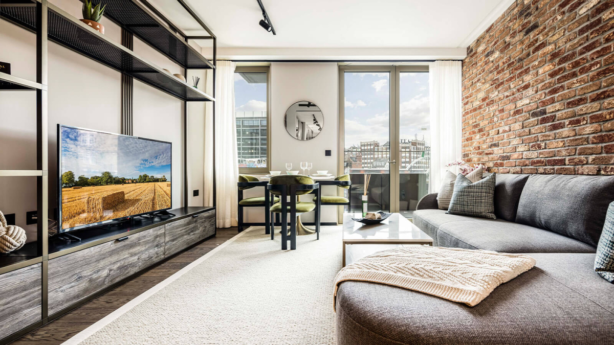 Living room and balcony at Apartment 210 The Stage, ©Galliard Homes.