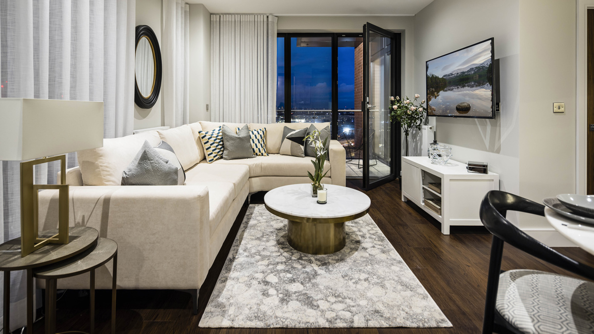 Open-plan kitchen, living and dining area at an Orchard Wharf apartment, ©Galliard Homes.