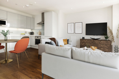 Open-plan kitchen, living and dining area at an Orchard Wharf apartment, computer generated image intended for illustrative purposes only, ©Galliard Homes. Open-plan kitchen, living and dining area at an Orchard Wharf apartment, computer generated image intended for illustrative purposes only, ©Galliard Homes.