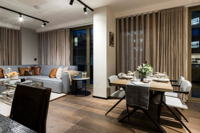 Open-plan living room of a one-bedroom apartment at The Stage, ©Galliard Homes. Open-plan living room of a one-bedroom apartment at The Stage, ©Galliard Homes.