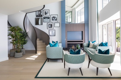 Penthouse living area with double-height ceilings, and staircase to the upper level, ©Galliard Homes. Penthouse living area with double-height ceilings, and staircase to the upper level, ©Galliard Homes.