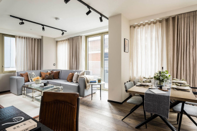 Open-plan living and dining room at a two-bedroom apartment at The Stage, ©Galliard Homes.