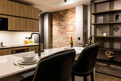 Open-plan kitchen area of a one-bedroom apartment at The Stage, ©Galliard Homes.