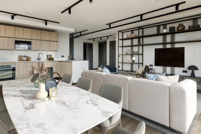 Living area and kitchen at a three-bedroom apartment at The Stage, furniture superimposed for illustrative purposes only, ©Galliard Homes.