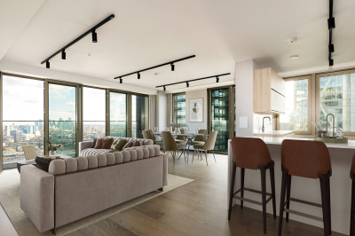 Reception room of a three-bedroom apartment at The Stage, furniture superimposed for illustrative purposes only, ©Galliard Homes.