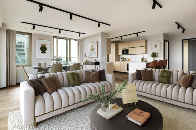 Living room and kitchen of a three-bedroom apartment at The Stage, furniture superimposed for illustrative purposes only, ©Galliard Homes.