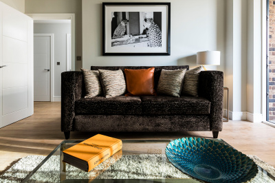 Living area and balcony at a Wimbledon Grounds apartment, ©Galliard Homes. Living area and balcony at a Wimbledon Grounds apartment, ©Galliard Homes.