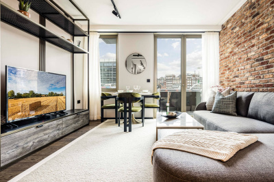 Living room and balcony at Apartment 210 The Stage, ©Galliard Homes. Living room and balcony at Apartment 210 The Stage, ©Galliard Homes.
