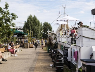 Living in Hackney Wick, East London Hackney Wick Canal Café with cyclists, Galliard Homes image